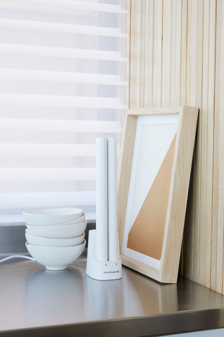 Hunter Douglas rechargeable battery wands in a dual charging station