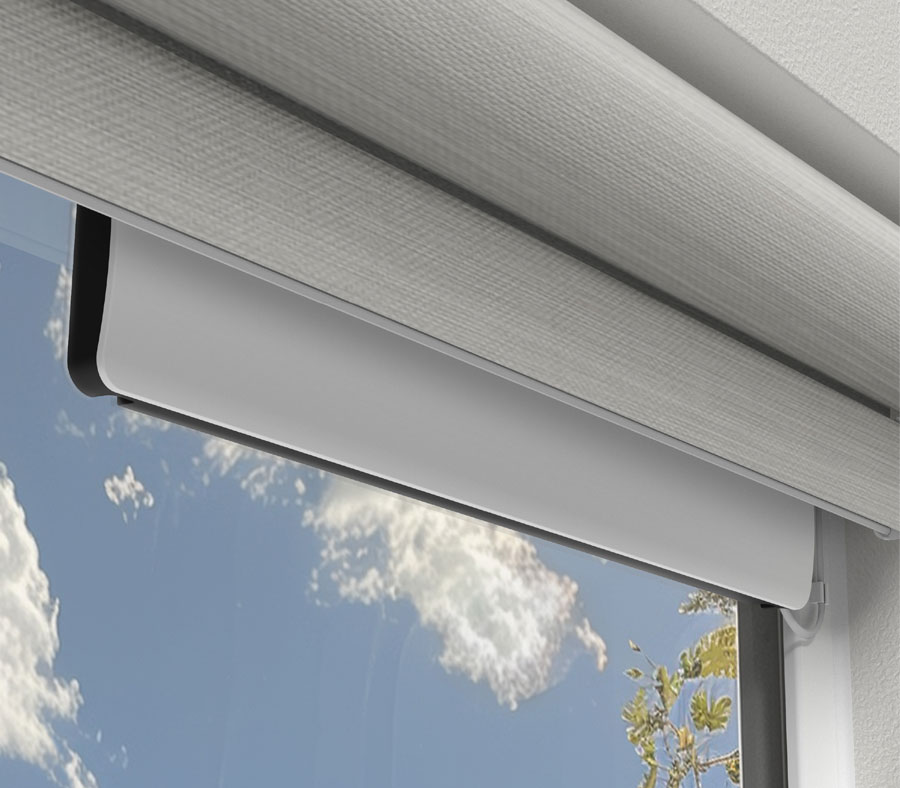 PowerView® Solar Charger installed in a window with motorized shades