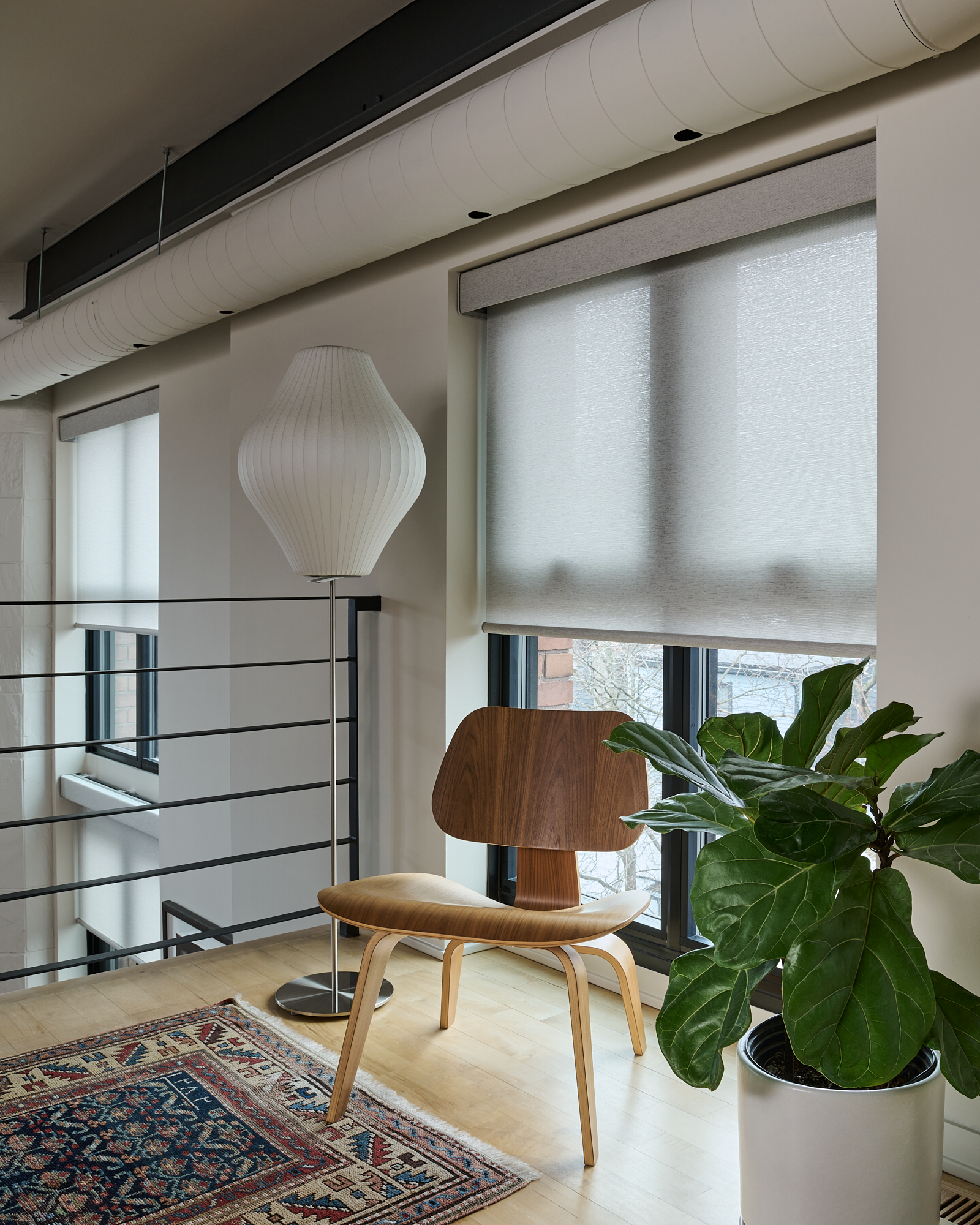 Contemporary motorized roller shades in a unique Lesliville building