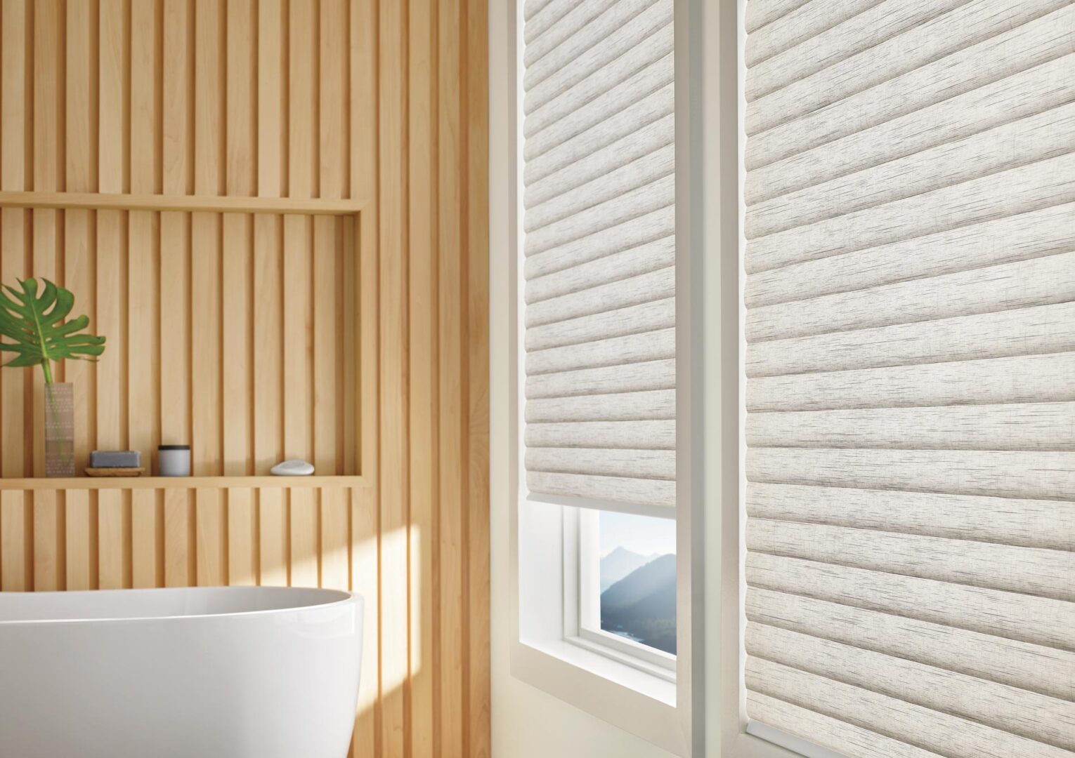Sonnette cellular roller shades in a bathroom for privacy and insulation