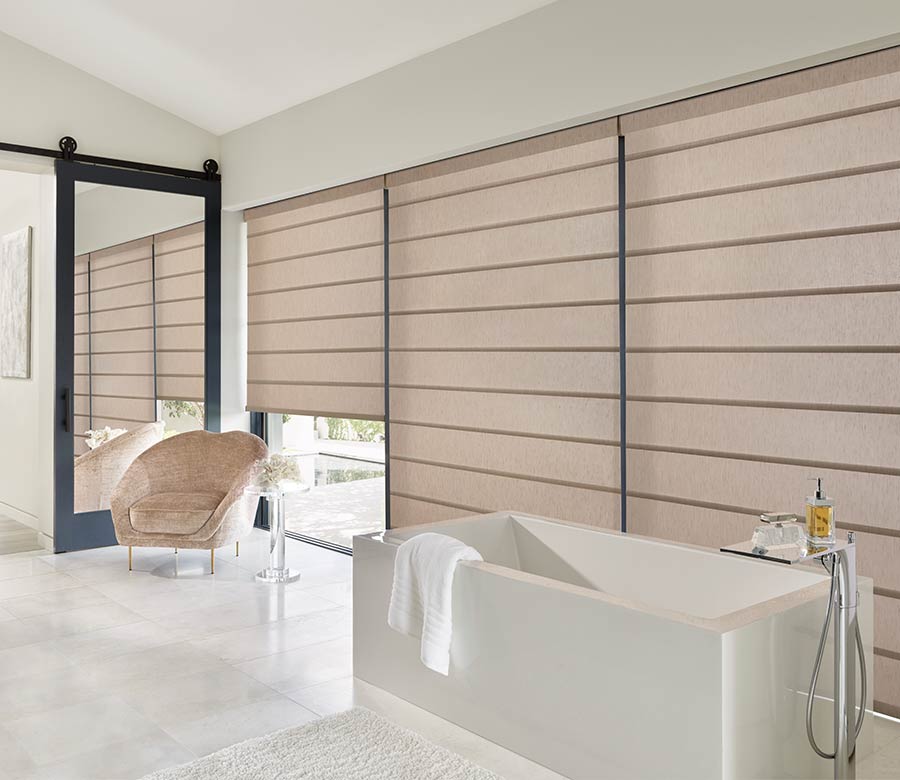 bathroom wall of windows with luxury roller blinds toronto