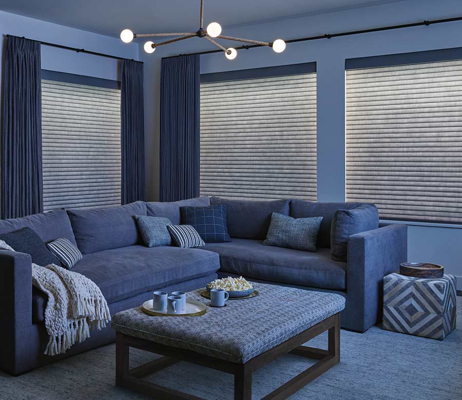 cellular roller shades closed with LED lighting on from the shades