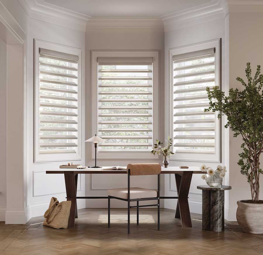 pirouette shades on bay windows on Toronto home office
