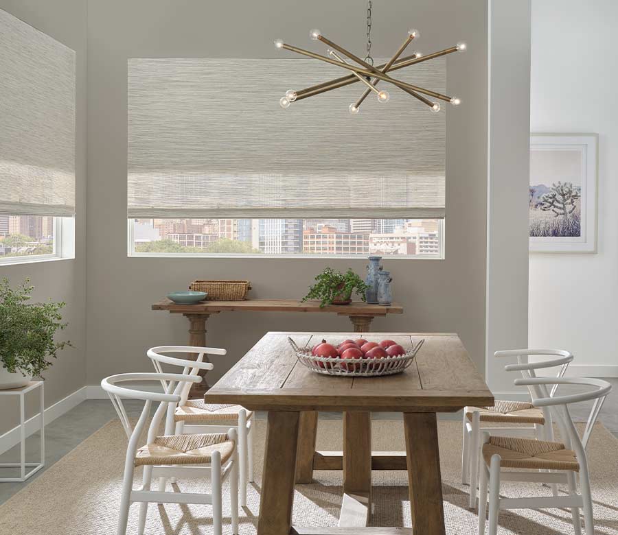 dining room with white dual woven wood shades