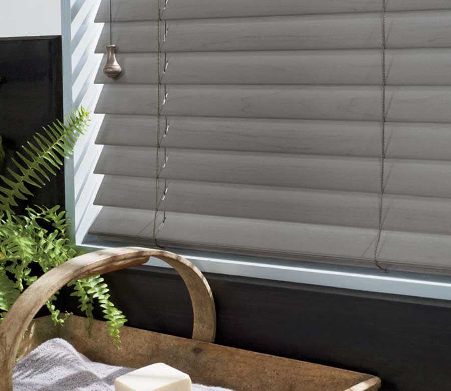 close up of everwood venetian blinds above kitchen sink