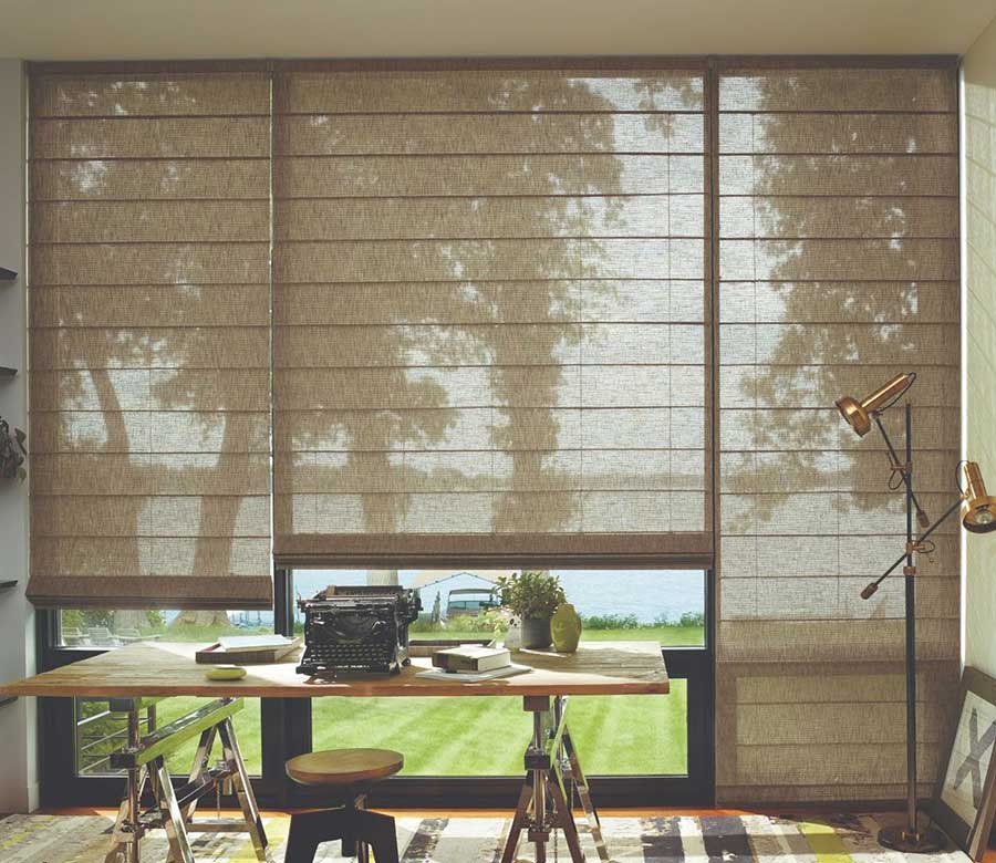 office with natural colored alustra roman shades
