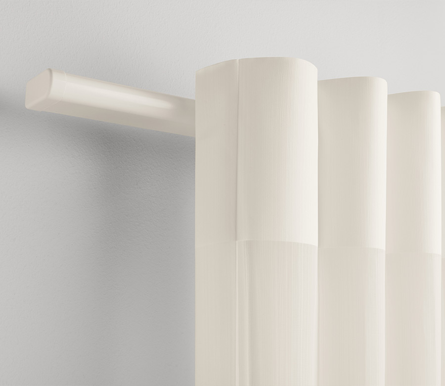 close up of white head rail for luminette vertical sheer shades