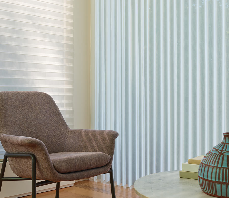 vertical Luminette privacy sheer window shades in living room