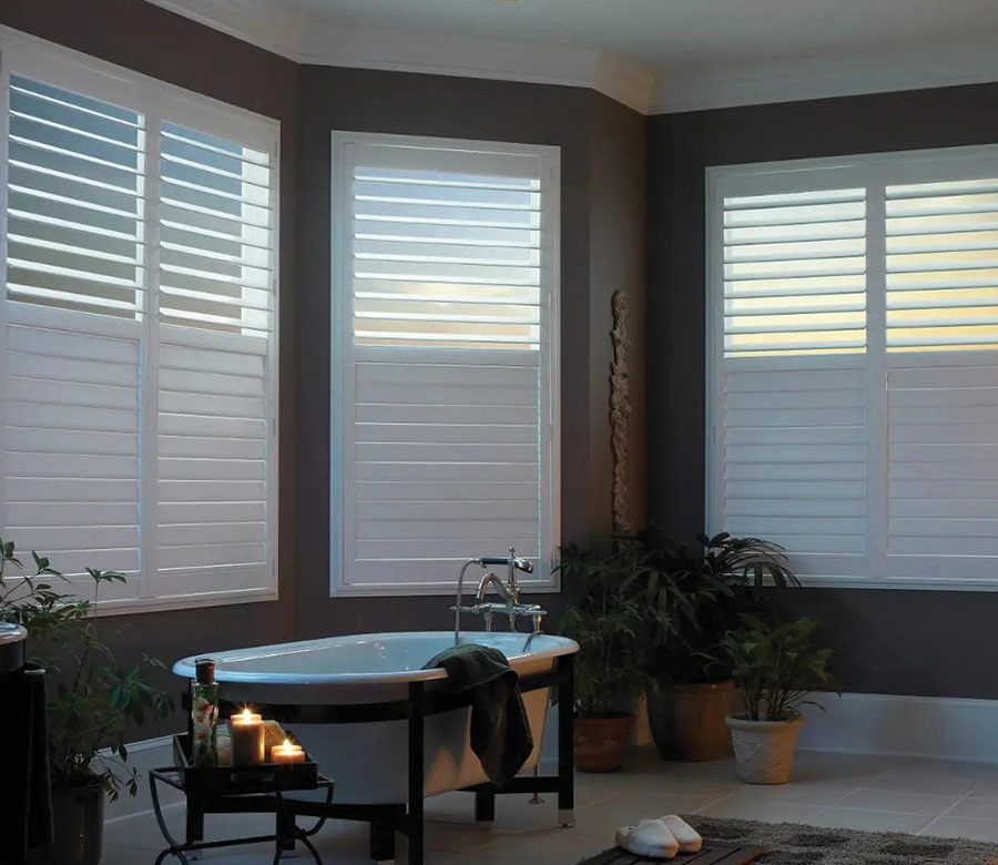 bathroom with white eclipse shutters