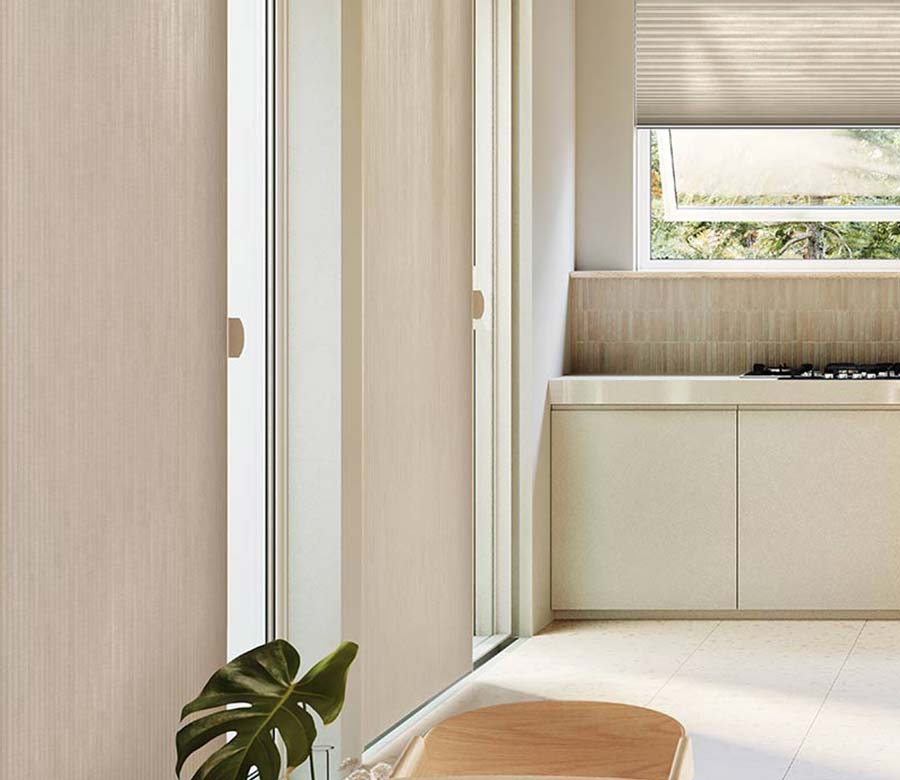 large glass doors in kitchen covered by vertical window shades in toronto, ca home
